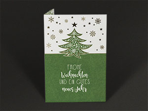 Abbildung der aufgeklappten, grünen Weihnachtskarte.